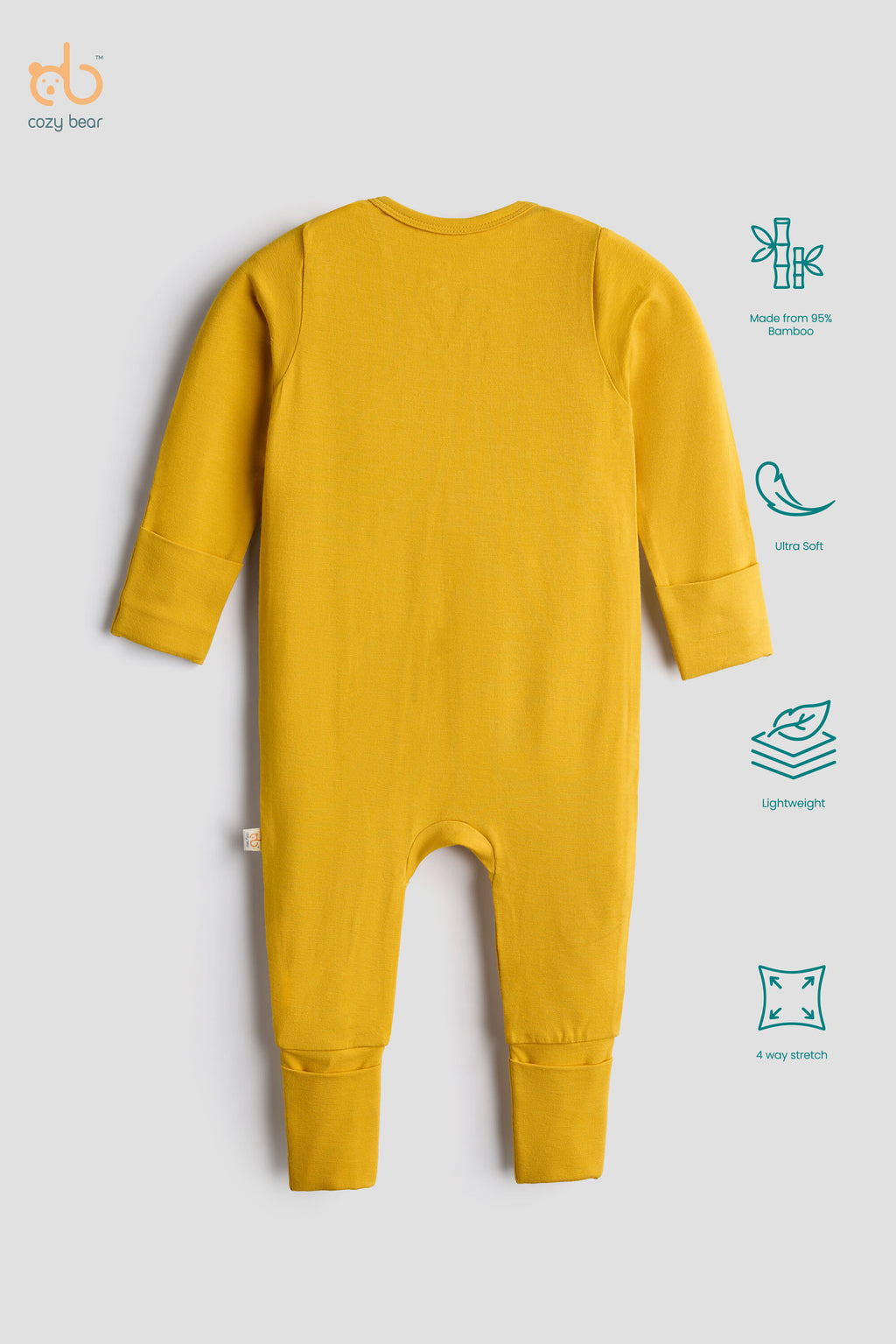 A mustard yellow ribbed long-sleeve baby jumpsuit shown from the back on a light gray background, with feature icons and text on the right side.
