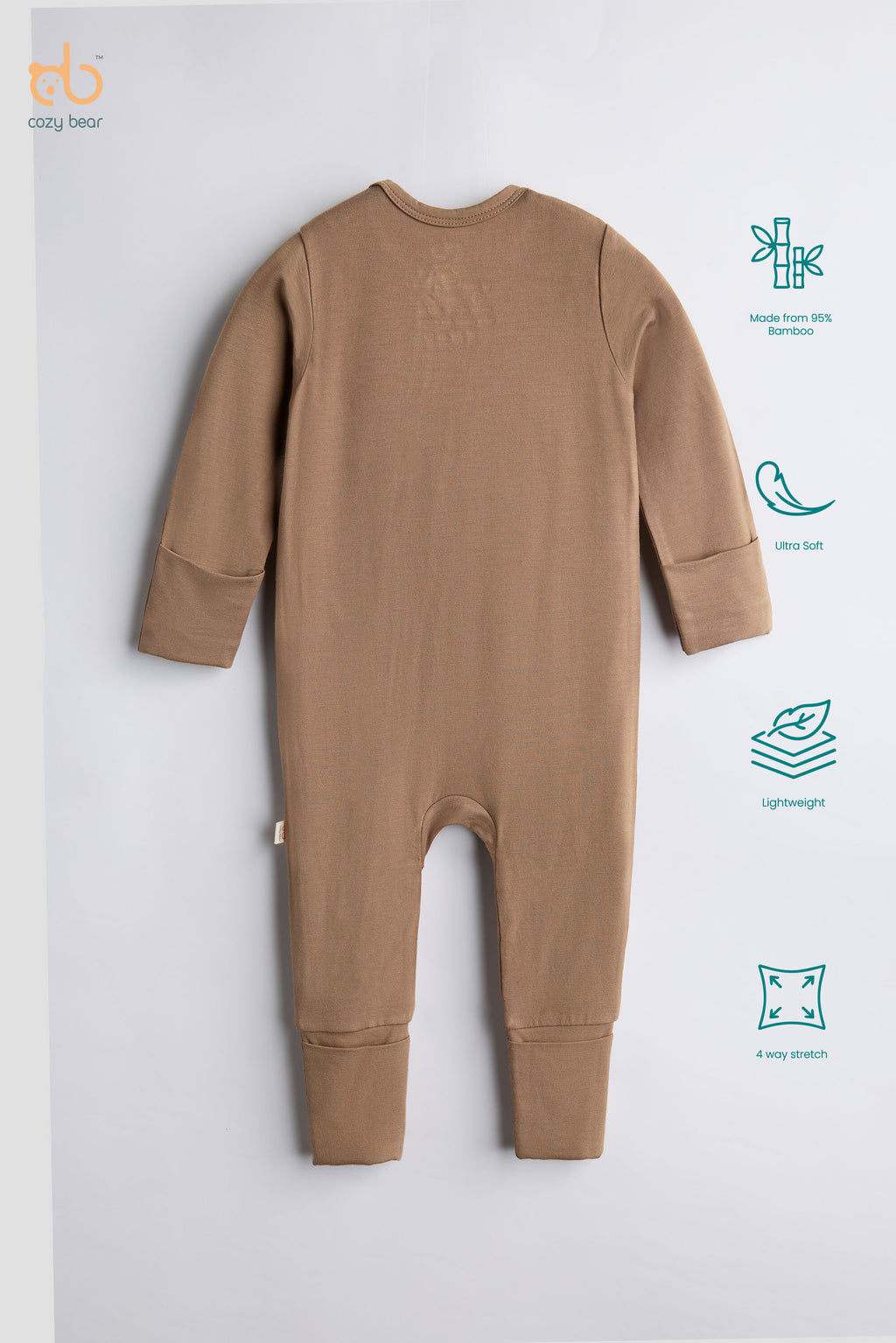 A baby long-sleeve ribbed footless romper in a warm tan color, shown from the back on a light gray background with feature icons on the right.