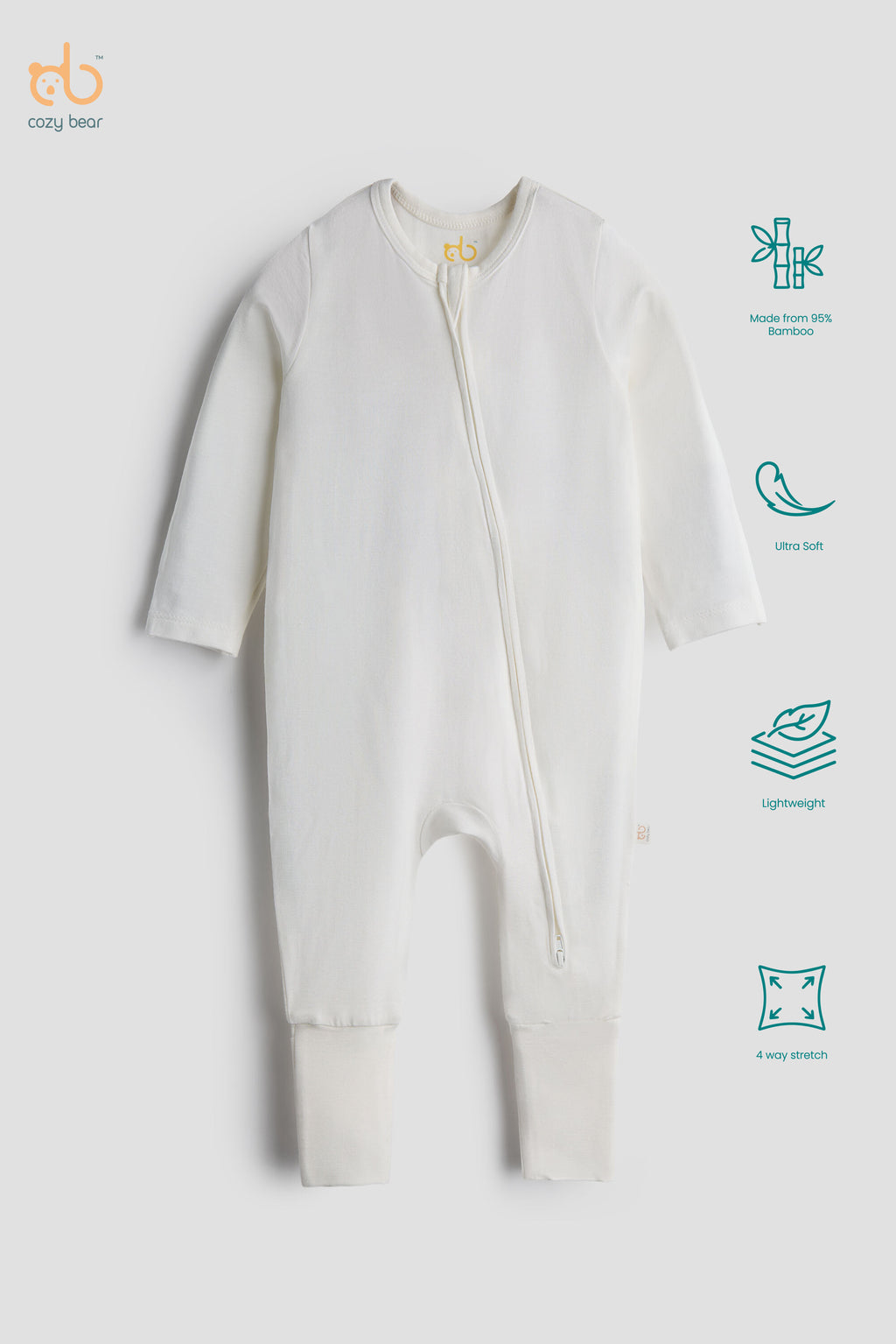 A baby long-sleeve footless zip-up sleeper in off-white, displayed on a light gray background with feature icons on the right side. The brand logo 'coco bear' is visible in the top left corner.