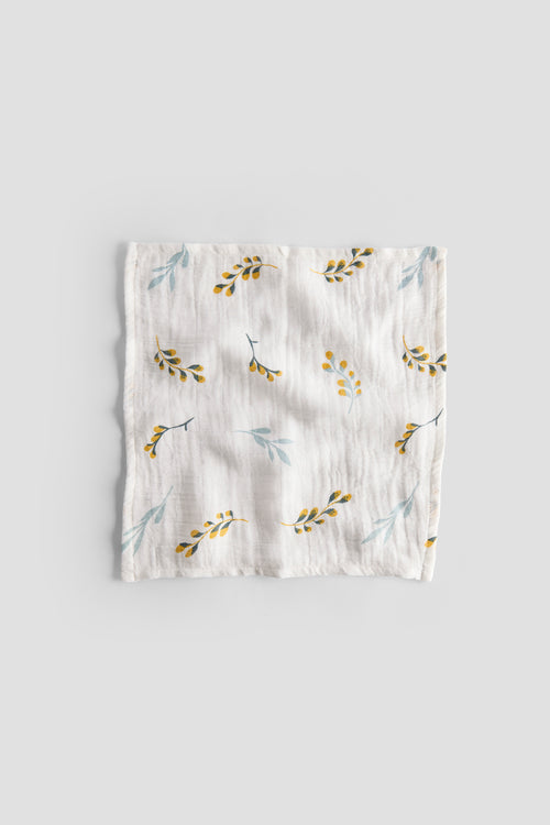 Floral patterned baby blanket on a light gray background