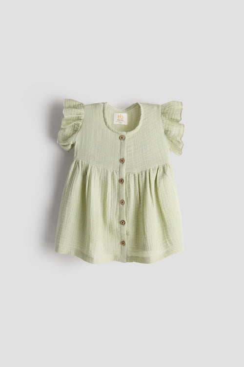 Light green baby dress with ruffled sleeves on a white background