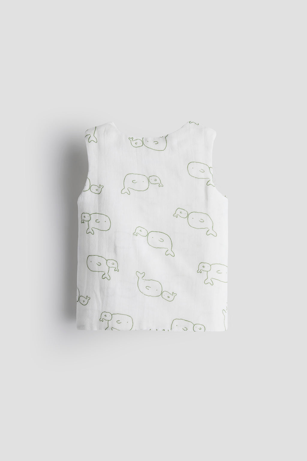 Pack of baby pants with whale pattern on a light gray background